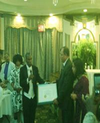 Pastor Sunny Philip receives pastor of the year award.